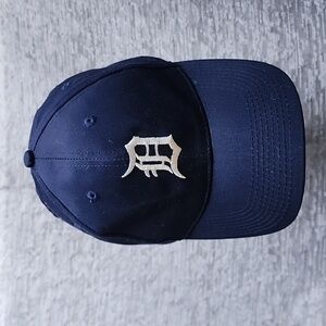 Detroit Tigers baseball cap.